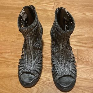 Like new. Worn twice . Sexy peep toe leather bootie/sandal.